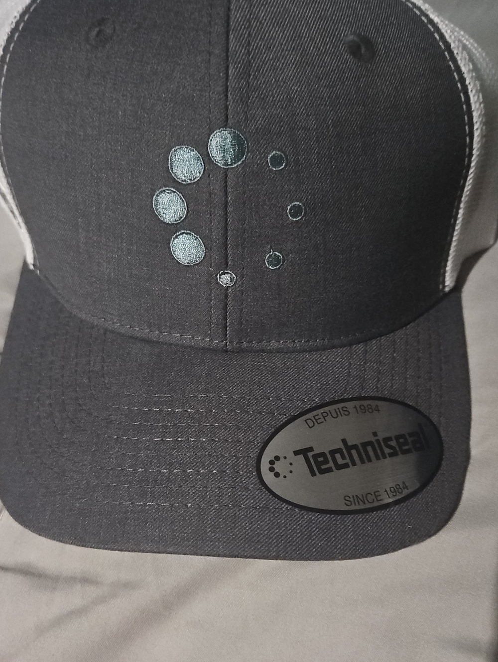 Men's Black Baseball Cap with Metal Logo Badge